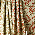 Patterned curtain fabrics.