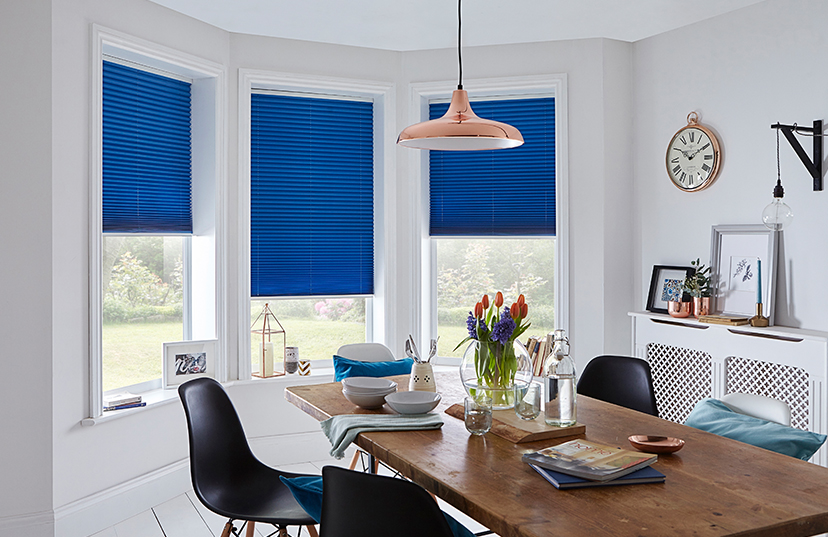 Bright blue pleated blinds