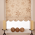 Laminated blind with a leaf pattern.