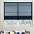 Cobalt blue roman blind in a living room setting.